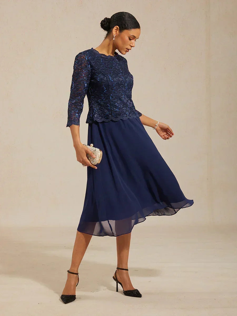 Vestido midi con encaje y manga tres cuartos