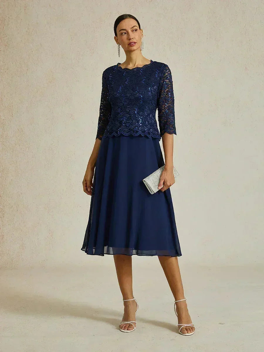 Vestido midi con encaje y manga tres cuartos