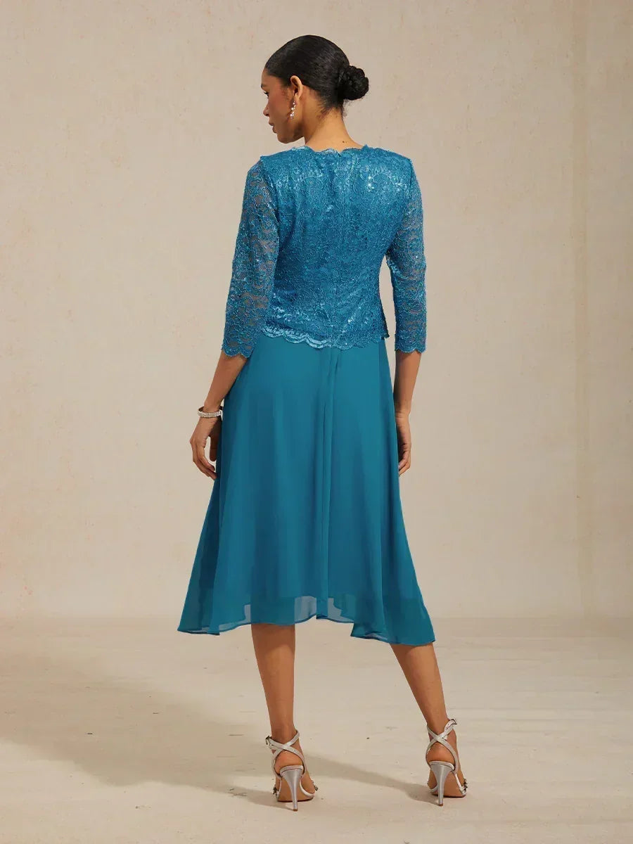 Vestido midi con encaje y manga tres cuartos