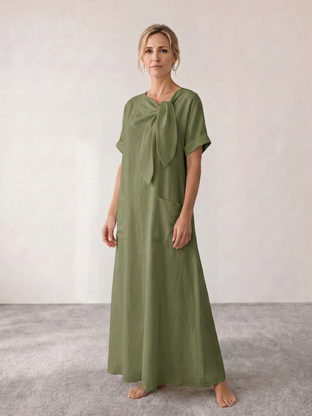 Vestido midi fluido con lazada al cuello