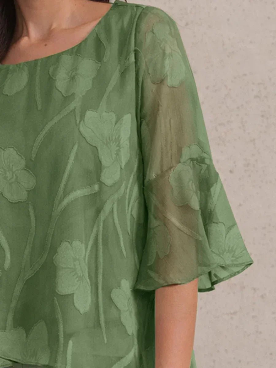 Blusa elegante de gasa con bajo asimétrico - Nhaura