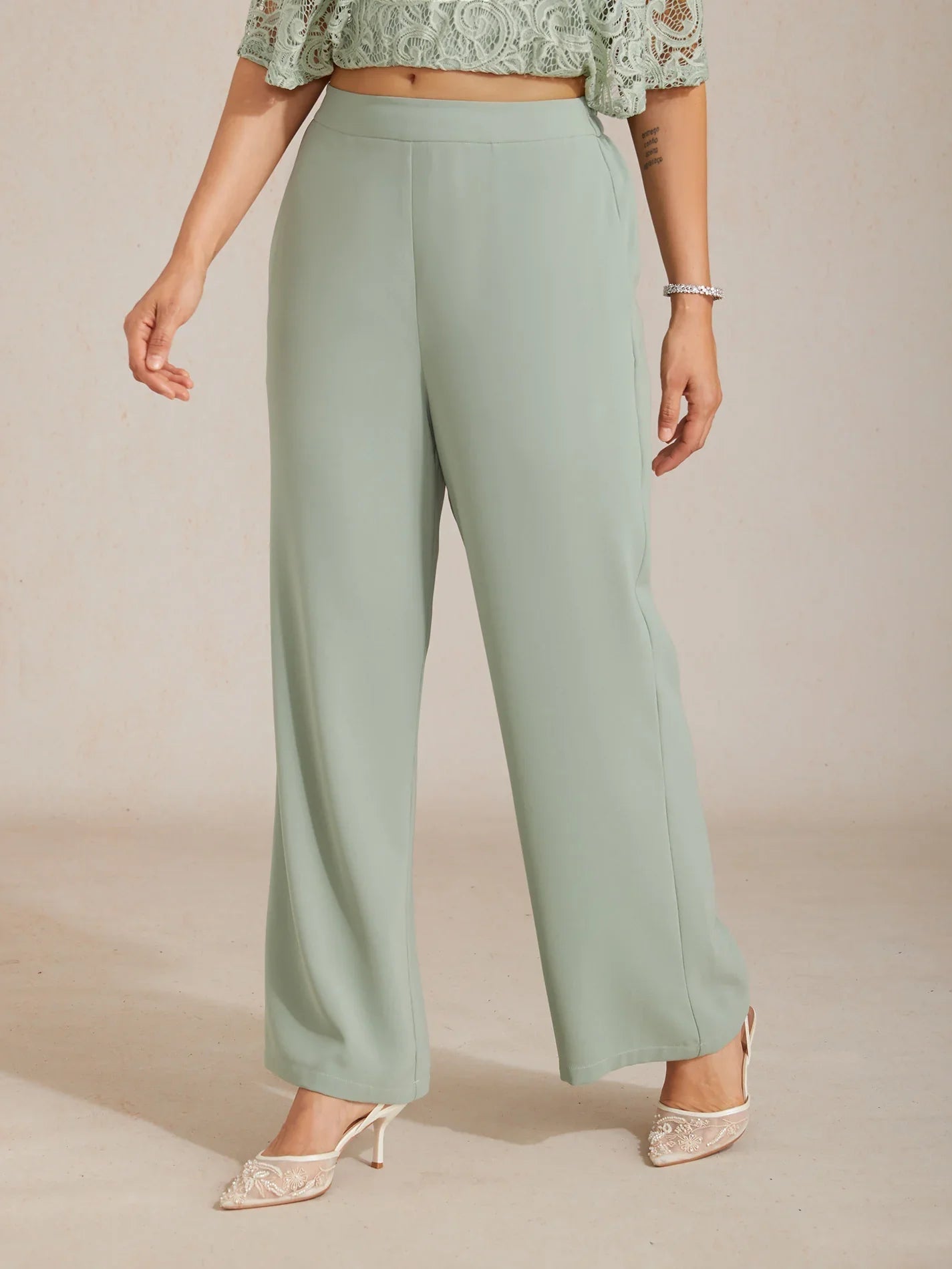 Pantalón ancho de tiro medio con cintura elástica y bolsillos - Nhaura