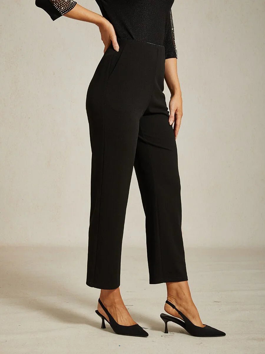 Pantalón negro de pierna estrecha con cintura elástica y bolsillos laterales - Nhaura