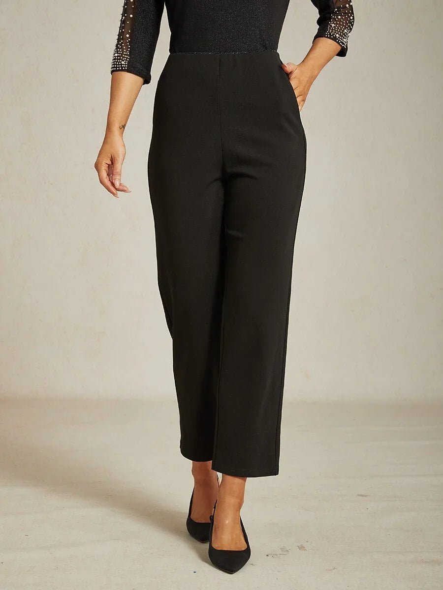 Pantalón negro de pierna estrecha con cintura elástica y bolsillos laterales - Nhaura