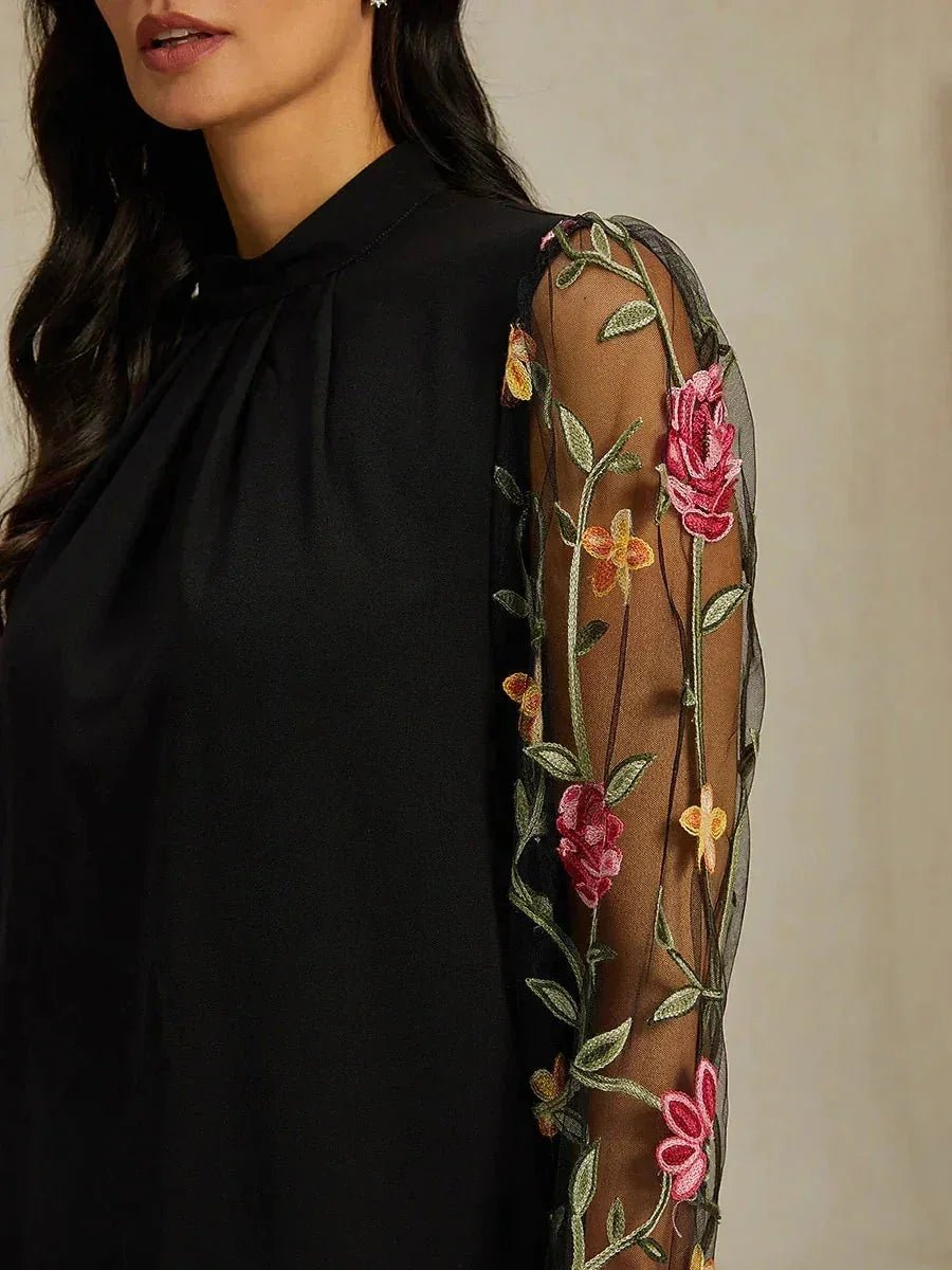Top discreto de tul con bordado floral - Nhaura