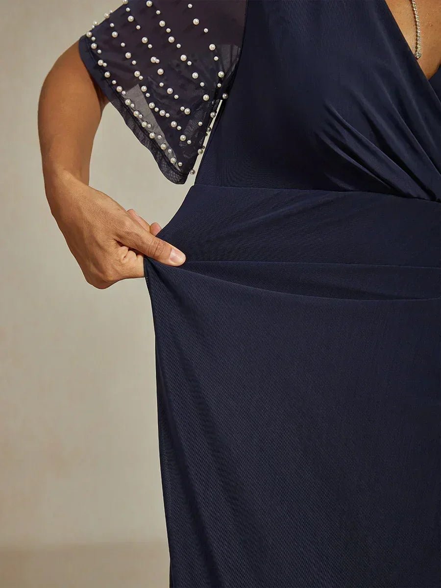 Vestido formal elegante con mangas fluidas adornadas - Nhaura